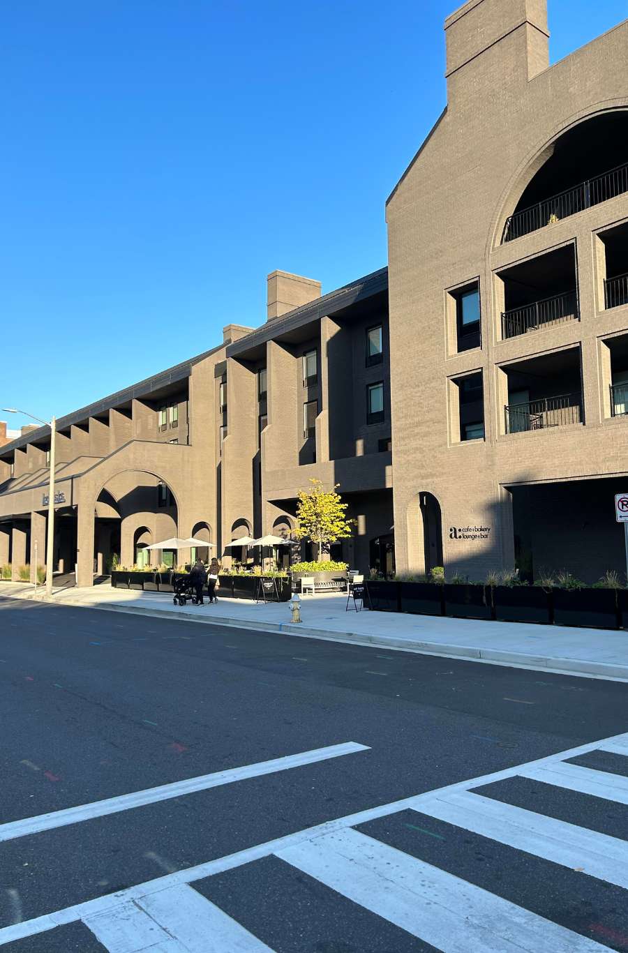AKA Hotel exterior masonry restoration and staining