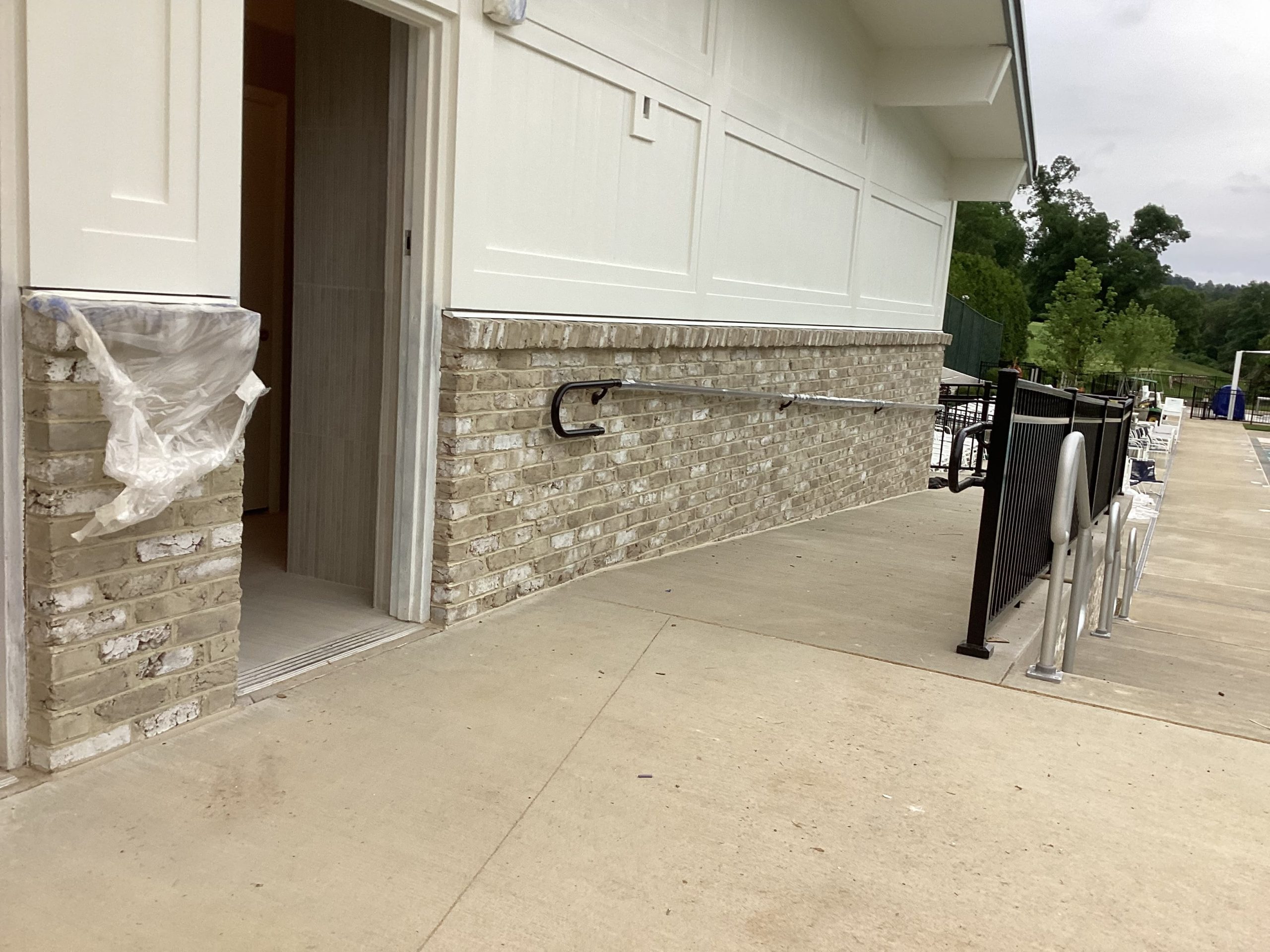 Commercial building with completed gray masonry stain