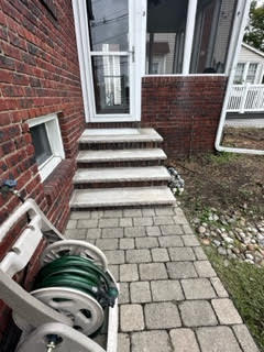 Corner detail of stained brick residence in South Jersey