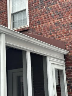 Detail of a stained brick wall showing natural texture